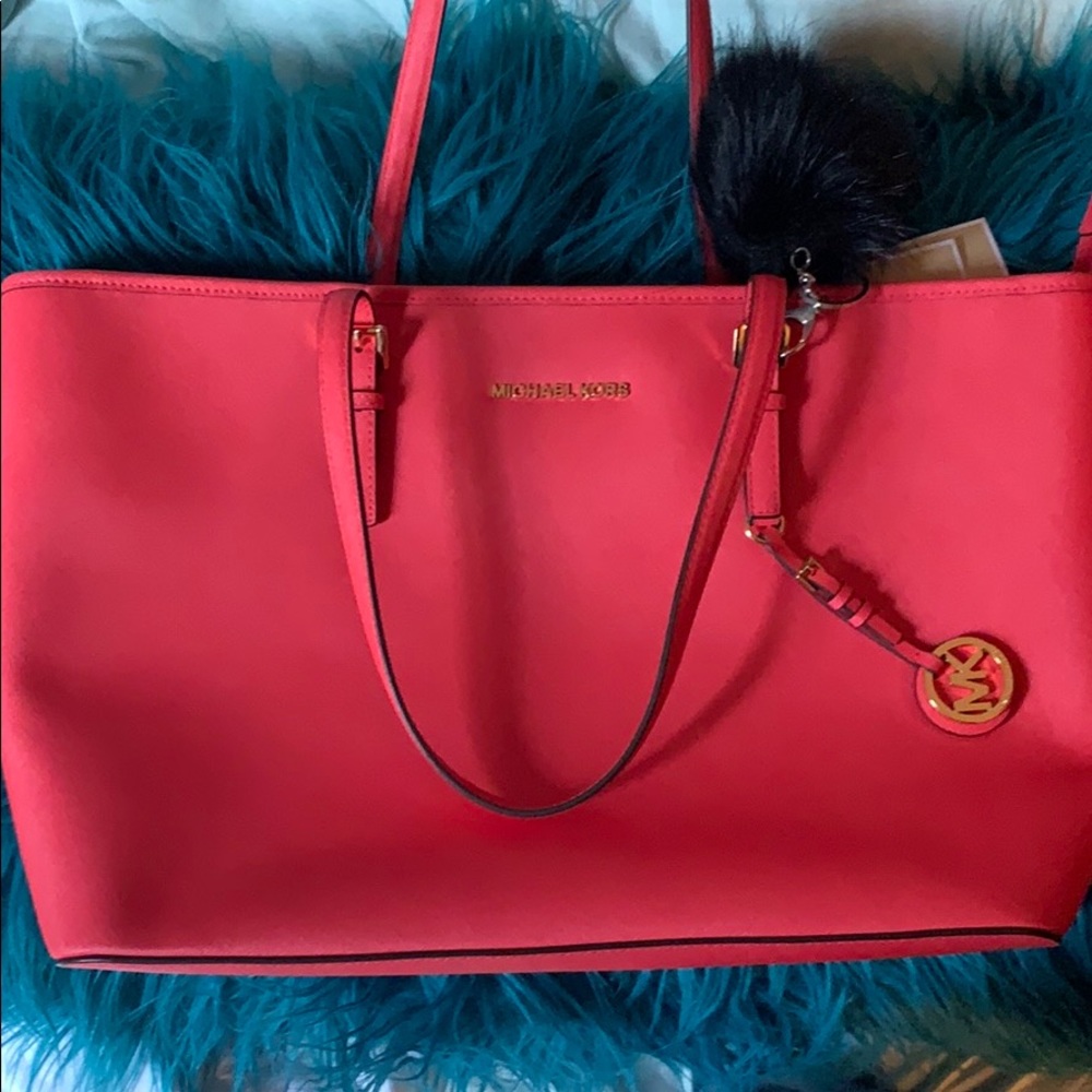 MK jet set travel Coral Reef